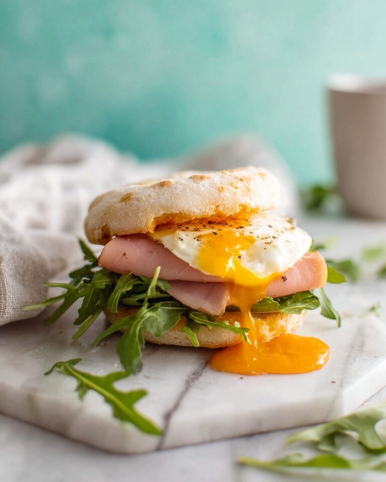 Brunch Egg Sandwich with Poached Eggs, Arugula, and Prosciutto Recipe