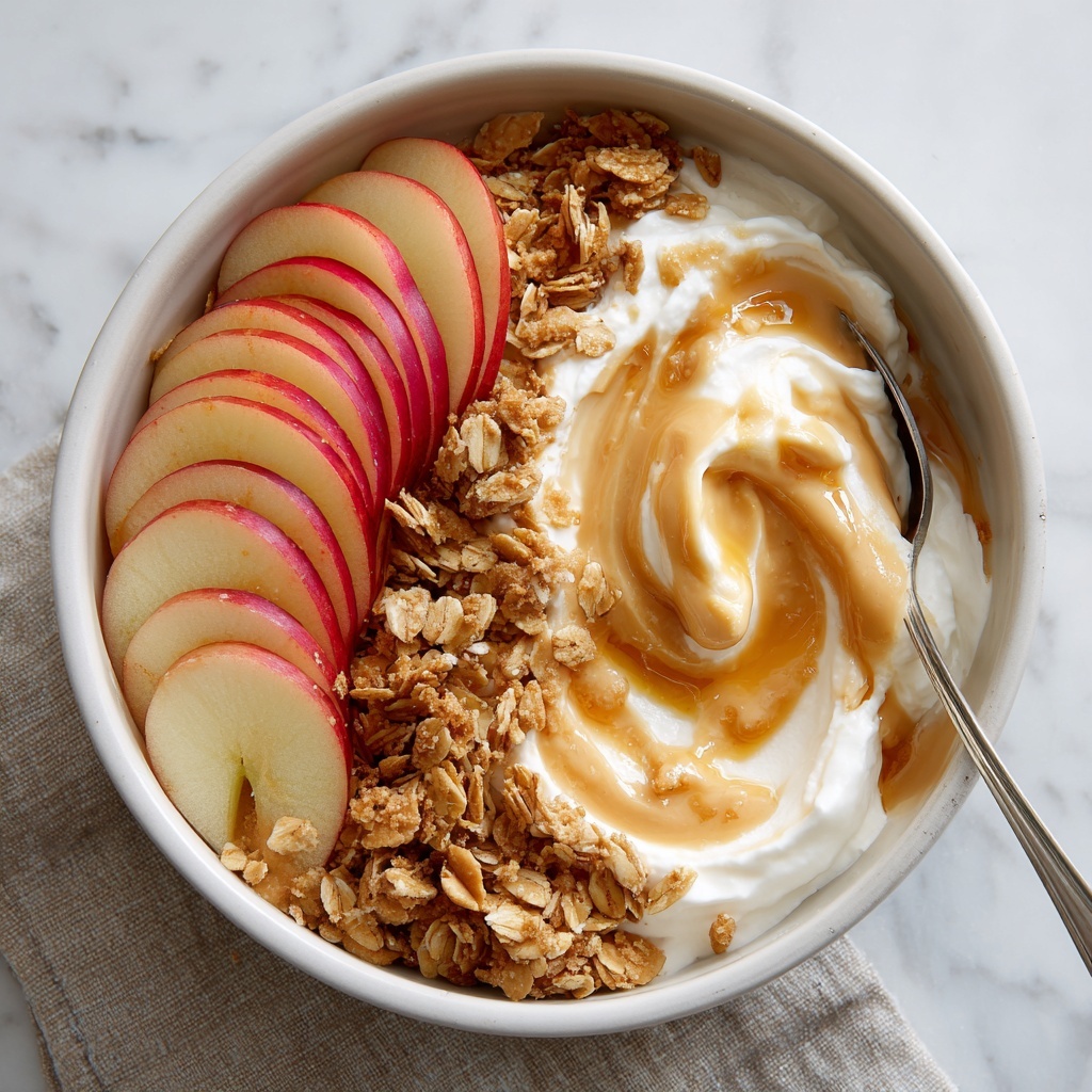 Apple Cinnamon Yogurt Bowl with Peanut Butter and Granola Recipe - Recipe Image