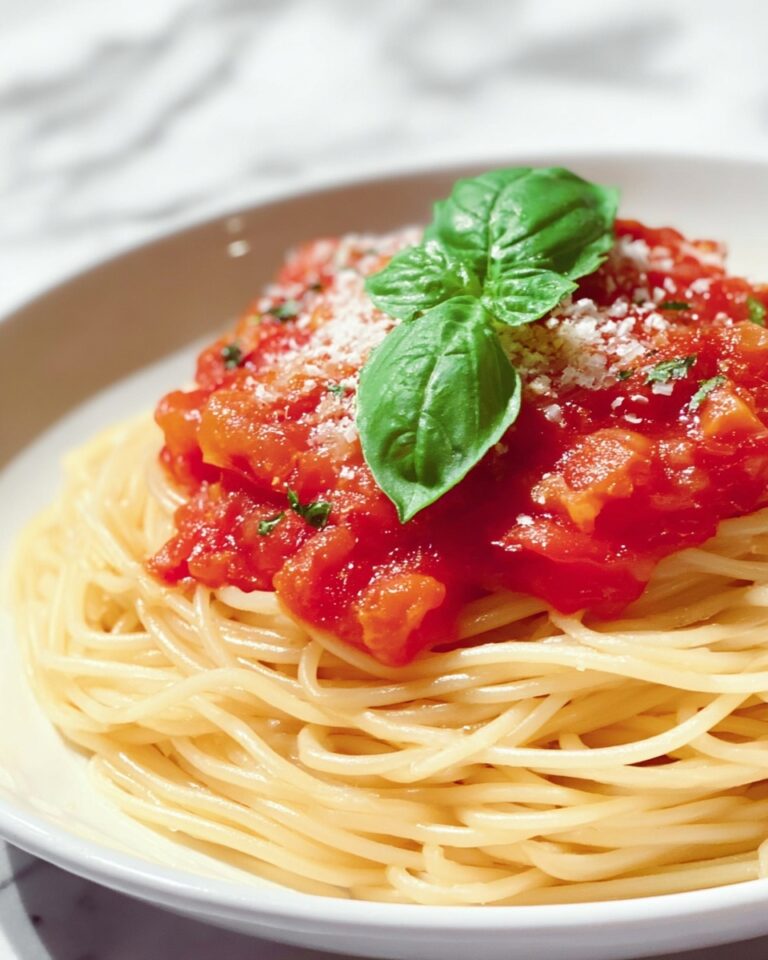 Instant Pot Spaghetti with Ground Beef, Tomato Sauce, and Fresh Basil Recipe