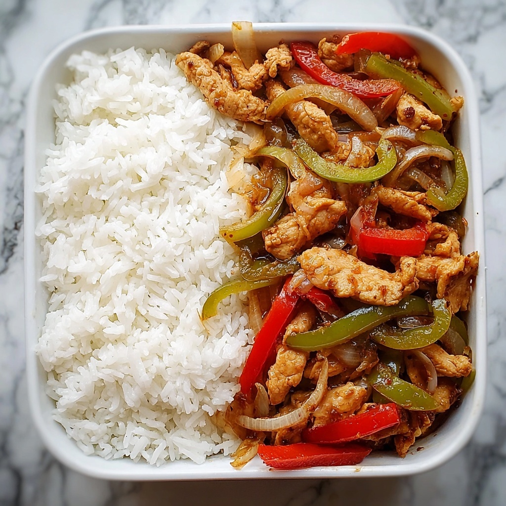 Spicy Garlic Pepper Chicken Stir-Fry with Steamed Rice Recipe - Recipe Image